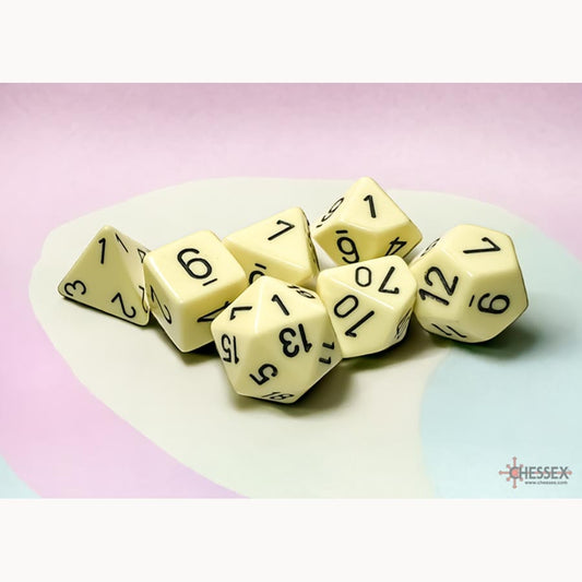 Chessex: 7CT POLYHEDRAL DICE SET: OPAQUE PASTEL YELLOW/BLACK